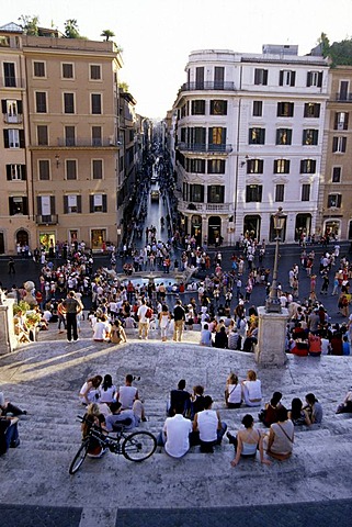 People populating Spanish Steps, Piazza di Spagna, Scalinata della Trinita dei Monti, view from above of the Via dei Condotti, Rome, Italy, Spain, Europe