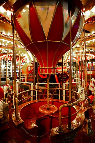 Children's roundabout at night in Vienna Prater Park, Vienna, Austria, Europe