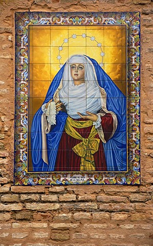 Picture of Mary on elaborate ceramics, outer wall of a church in Seville, Andalusia, Spain, Europe