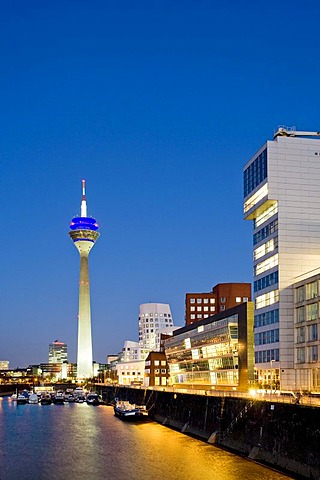 Rheinturm Tower, Frank O. Gehry buildings, Media Harbour, Duesseldorf, North Rhine-Westphalia, Germany, Europe