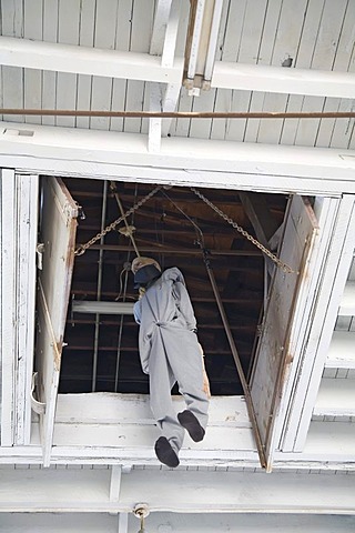 A dummy hangs where condemned prisoners were hanged at the West Virginia Penitentiary before an electric chair was installed; the prison was constructed in 1866 and closed in 1995 after a court ruled that the prison's 5x7-foot cells were cruel and unusual