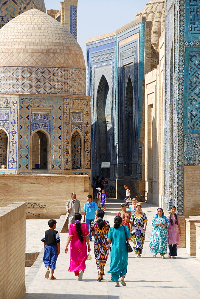 Colourful dressed women necropolis Shah-i-Zinda Samarkand Uzbekistan