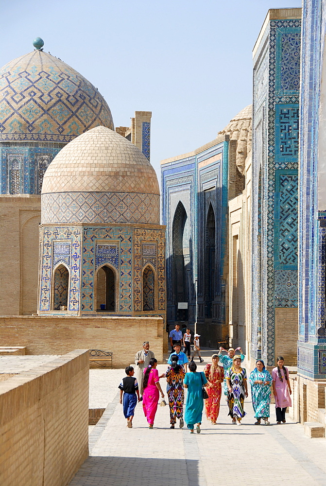 Colourful dressed women necropolis Shah-i-Zinda Samarkand Uzbekistan