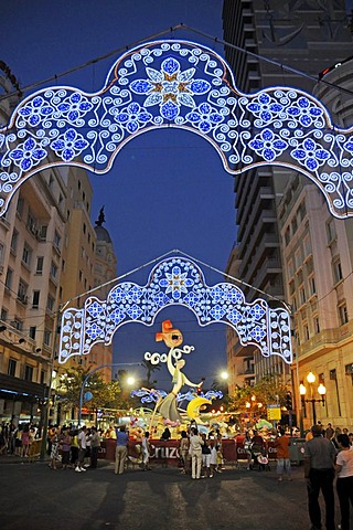 Hogueras de San Juan, Fogueres de Sant Joan, fiesta, country fair, papiermache figures, coloured lights, people, street, evening, night, Alicante, Costa Blanca, Spain, Europe