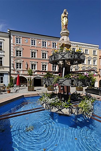 Kraiburg upon the river Inn district of Muehldorf Upper Bavaria Germany market square with St Mary's column and fountain