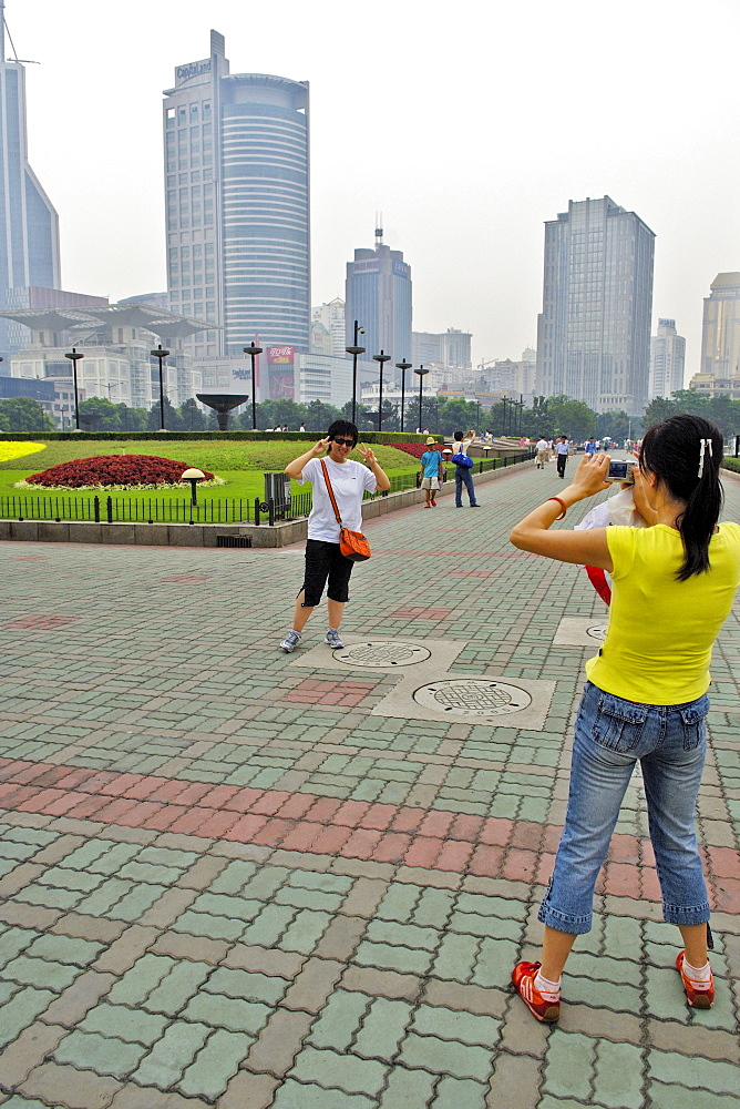 Public park, skyscrapers, chinese take some photos, Shanghai, China, Asia