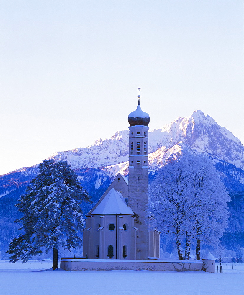 St. Coloman pilgrimage church under snow near Fuessen, Allgaeu, Bavaria, Germany, Europe