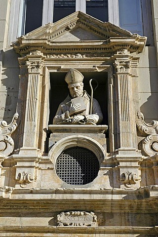 House front, priest, Valencia, Spain