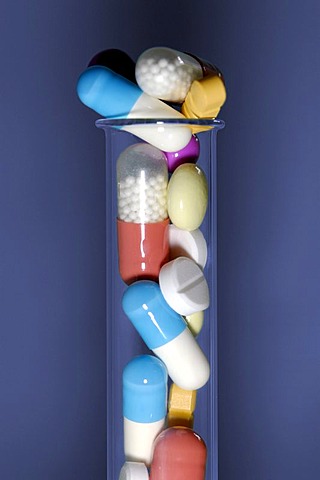 Tablets and pills in a test-tube