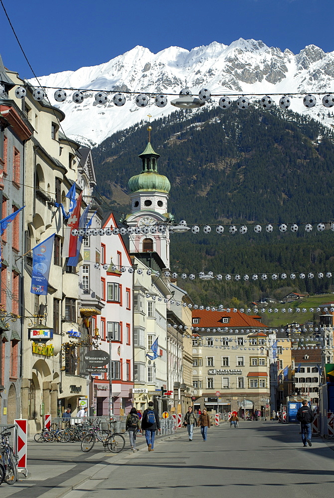 Historic centre of Innsbruck decorated with street lights in the shape of footballs for the 2008 UEFA European Football Championship, Karwendel Mountain Range of the Alps at back, Innsbruck, Tyrol, Austria, Europe