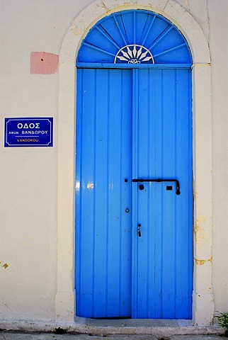 Blue front door, street sign, Fiscardo, Kefalonia, Ionian Islands, Greece