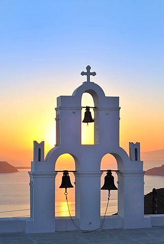 White Greek church with a blue dome and a bell tower at sunset, Firostefani, Santorini, Cyclades, Greece, Europe ***RESTRICTION: Not to be used for the travel industry (books, guides, brochures) in France between 1st of March 2011 and 31st of August 2011*