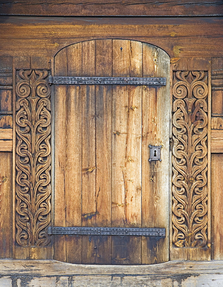 Carved wooden portal, Heddal Stave Church (Heddal Stavkirke), thirteenth-century stave church in Norway, Scandinavia, Europe