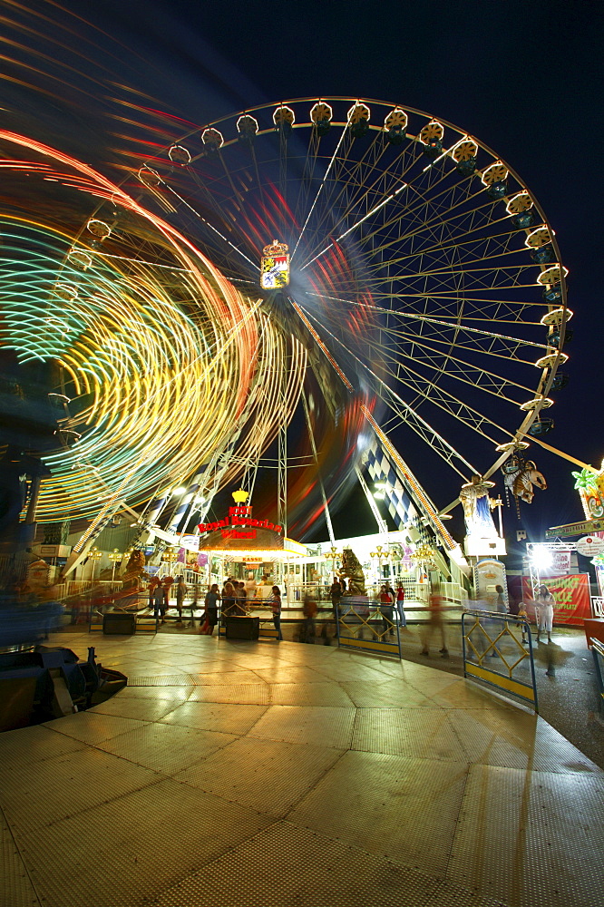 Giant wheel and carousel by night, funfair, Waldkraiburger Dult, Waldkraiburg, Upper Bavaria, Bavaria, Germany