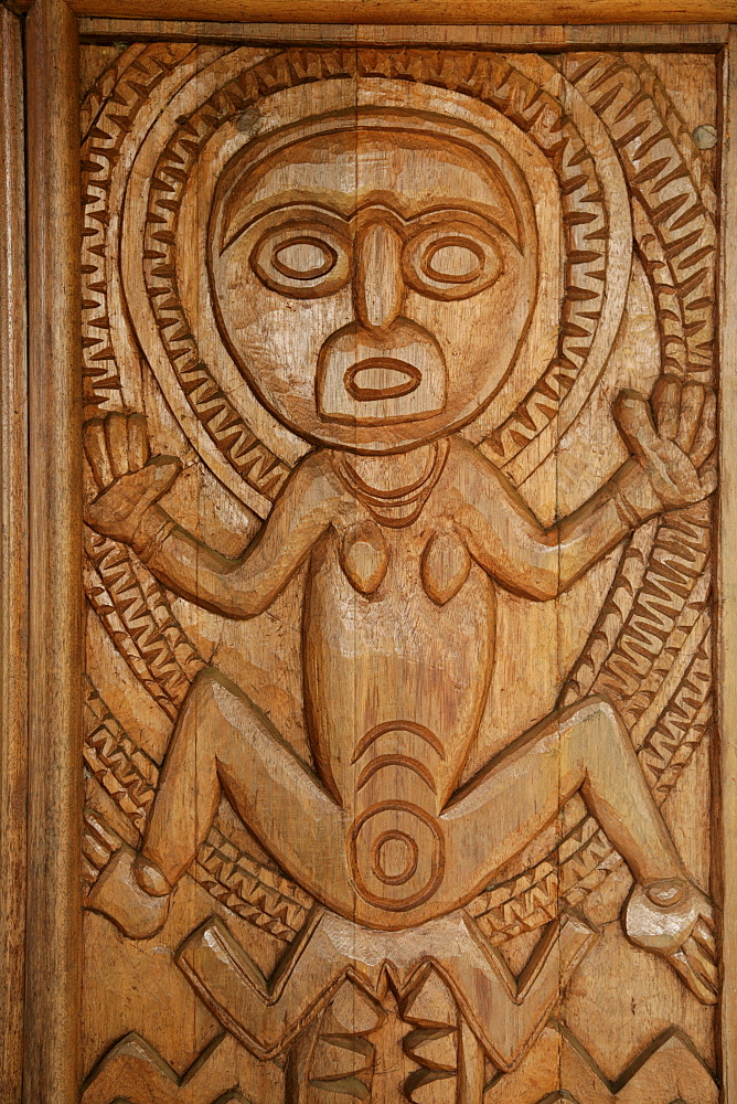 Woodcarvings at the entrance of the university library, Goroka, Papua New Guinea, Melanesia