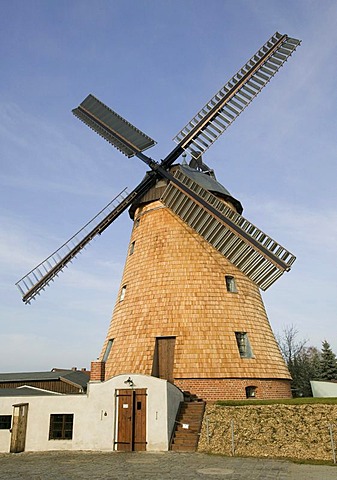 Straupitz in the Spreewald, DEU, 13.11.2005: Dutch windmill in Straupitz, a technical monument of 1910. In the historical oil mill Klaus Rudolph produces linseed oil.