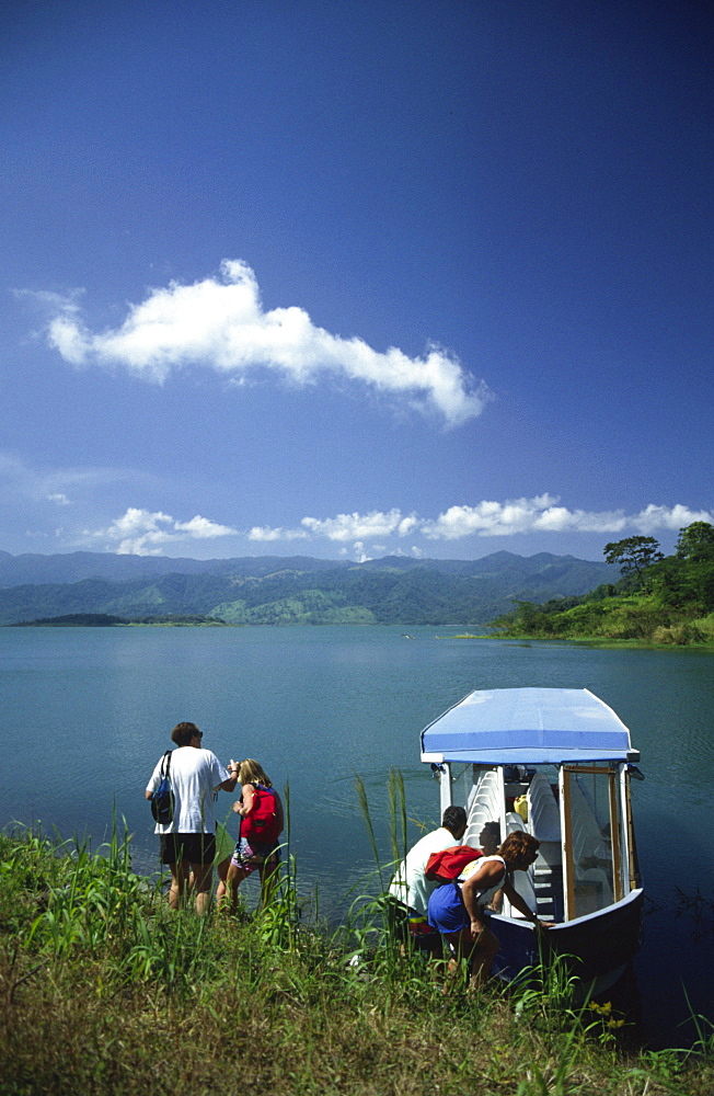 Boat trip on the lake Arenal close to La Fortuna, Costa Rica, Central America