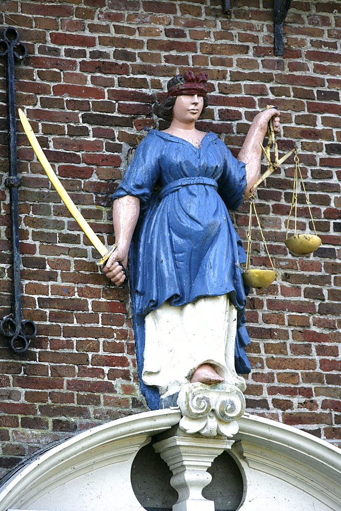 Justice statue in front of the old town hall, Hindeloopen, Ijsselmeer, Friesland, The Netherlands, Europe