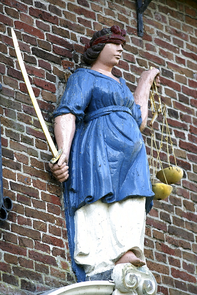 Justice statue in front of the old town hall, Hindeloopen, Ijsselmeer, Friesland, The Netherlands, Europe