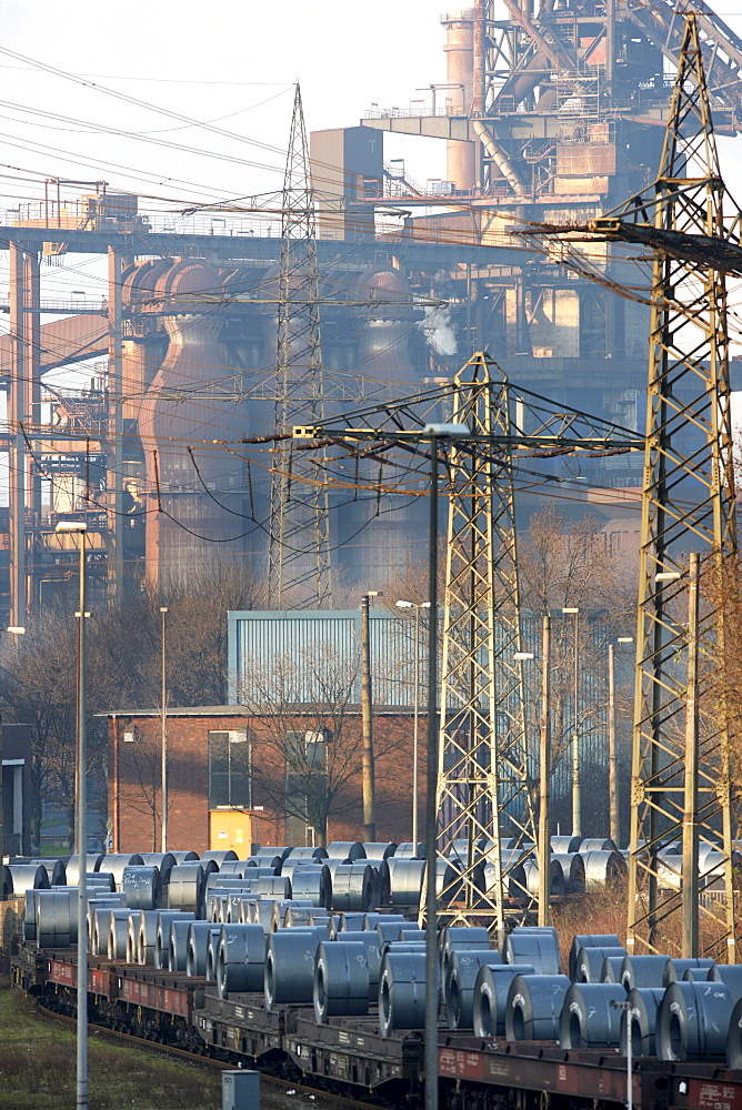 Freight train carrying a load of strip steel rolls, ThyssenKrupp Steelworks, Duisburg, North Rhine-Westphalia, Germany, Europe