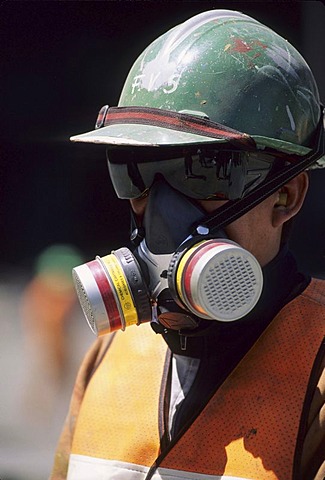 CHL, Chile, Atacama Desert: the Chuquicamata copper mine near Calama, a mine worker with protective mask.