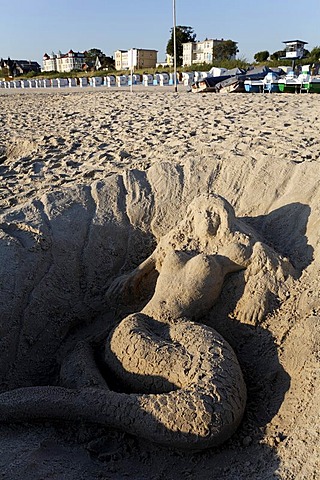 Sand sculpture of Nixe, the shape-shifting spirit, Bansin resort, Usedom, Mecklenburg-Western Pomerania, Germany, Europe