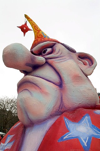 Face of a man with huge nose and mad eyes, caricature made of paper mache, monday before lent parade, Duesseldorf, NRW, Germany