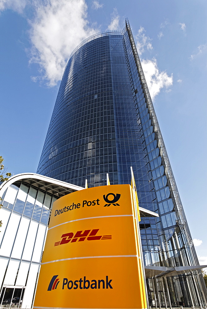 Board with company logos in front of the Post Tower, Bonn, NRW, Germany,