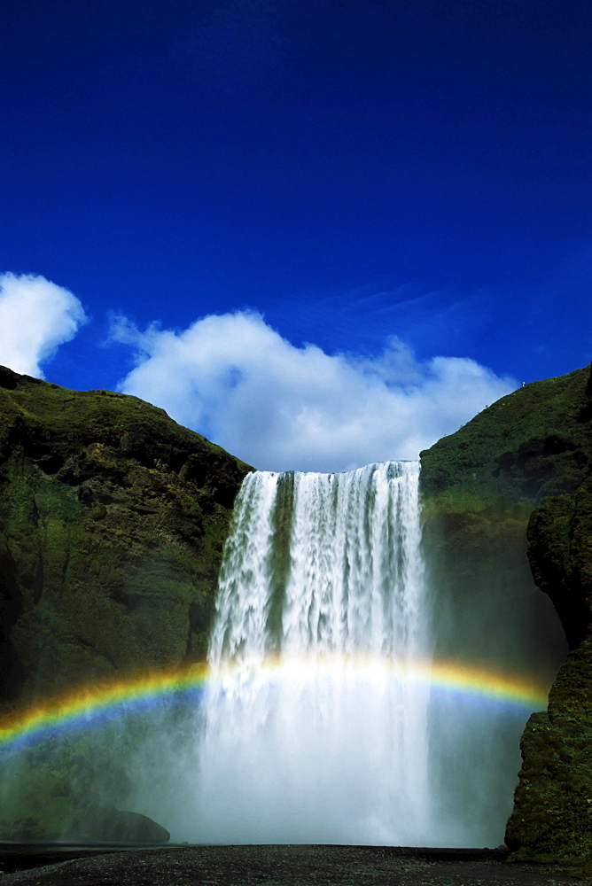 Rainbow over Skogafoss Waterfall, Iceland, Atlantic Ocean