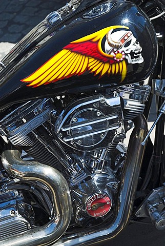 Painting of skull on the fuel tank of a Harley Davidson motorbike