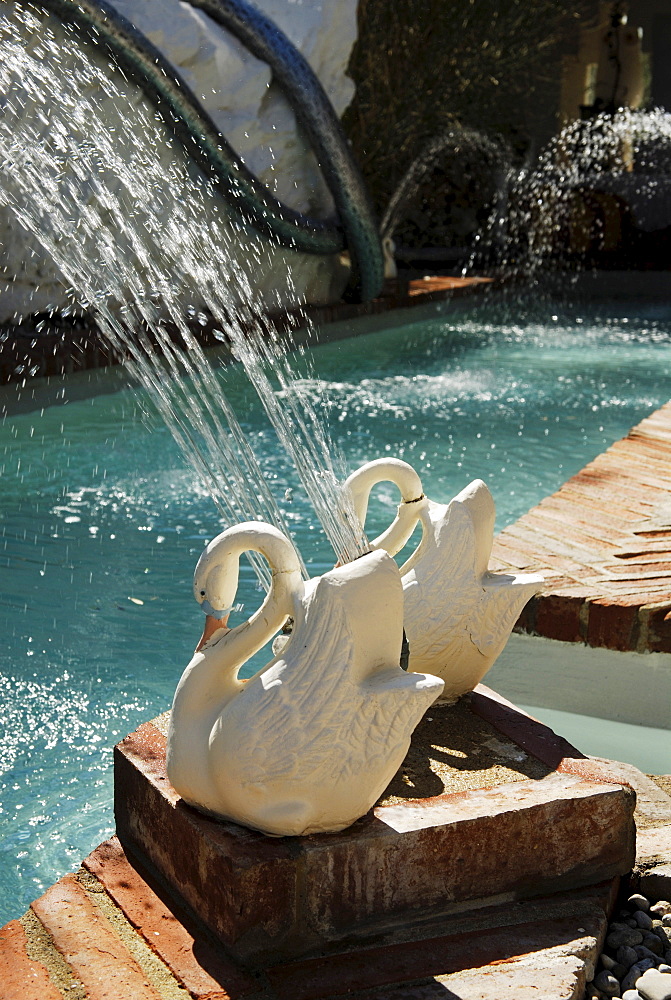 Phallus-shaped, phallic swimming pool in the garden at the former home of surrealist painter Salvador Dali and his wife Gala in Port Lligat, Province Girona, Spain