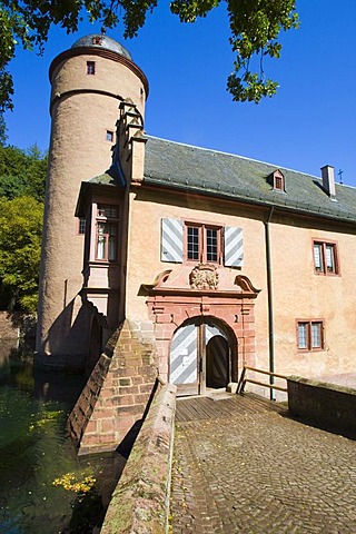 The moated castle Mespelbrunn is located in a remote side valley of the Elsava valley in Spessart, Bavaria, Germany.