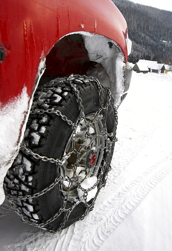 Car with snow chains, Germany.