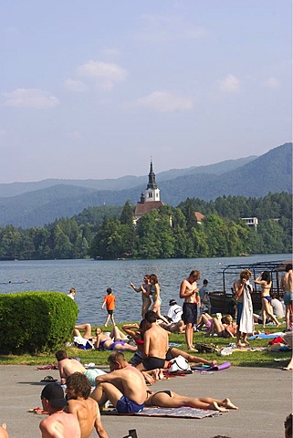 Beach at Lake Bled with St. Marie's Church on the iland - Slovenia