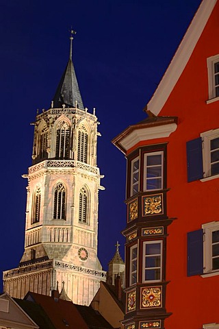 Church and bay windows at night of historical houses in Rottweil, Baden-Wurttemberg, Germany