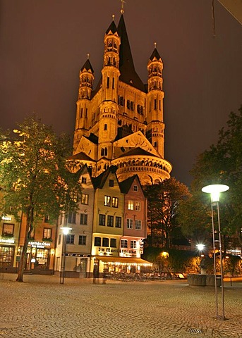 Facades of houses in front of the big St. Martin church in the city center of Cologne, NRW, Germany