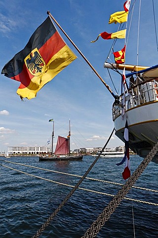 Flag of Germany, sailing boat, view of the Hohe Duene, beach resort, Warnemuende, Mecklenburg-Western Pomerania, Germany, Europe