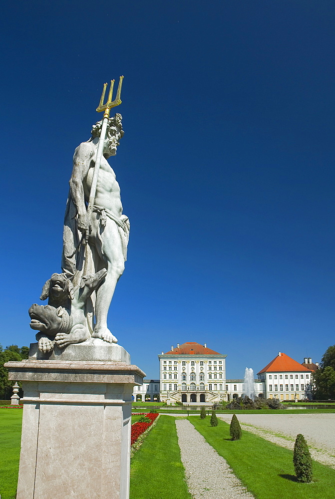 Sculpture of Hades, with Kerberos or Cerberus at his feet, in front of Nymphenburg Palace, Munich, Bavaria, Germany, Europe