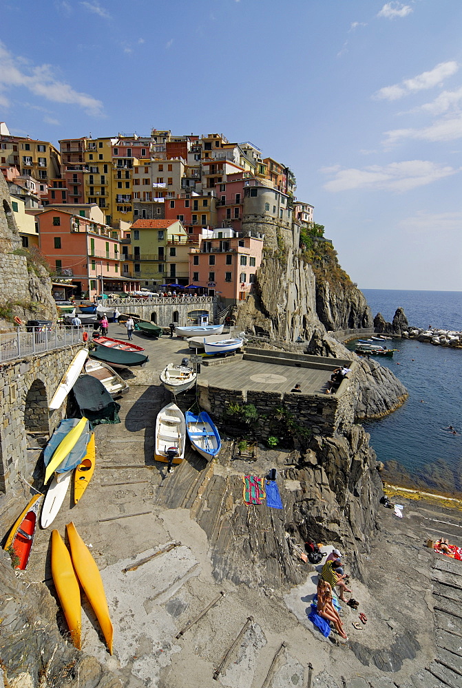 Picturesque cliff-top houses and the marina, harbour, of the village of Manarola in Cinque Terre, Liguria, Italy, Europe