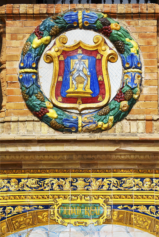 Emblem of Ciudad Real on the palace Palacio de Espana, Seville, Andalusia, Spain