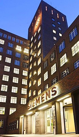 Wernerwerk multistory building in the evening, entrance, sign, Siemens AG, Berlin, Germany.