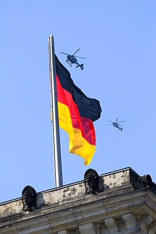 German flag with two helicopters, Reichstag, Berlin, Germany