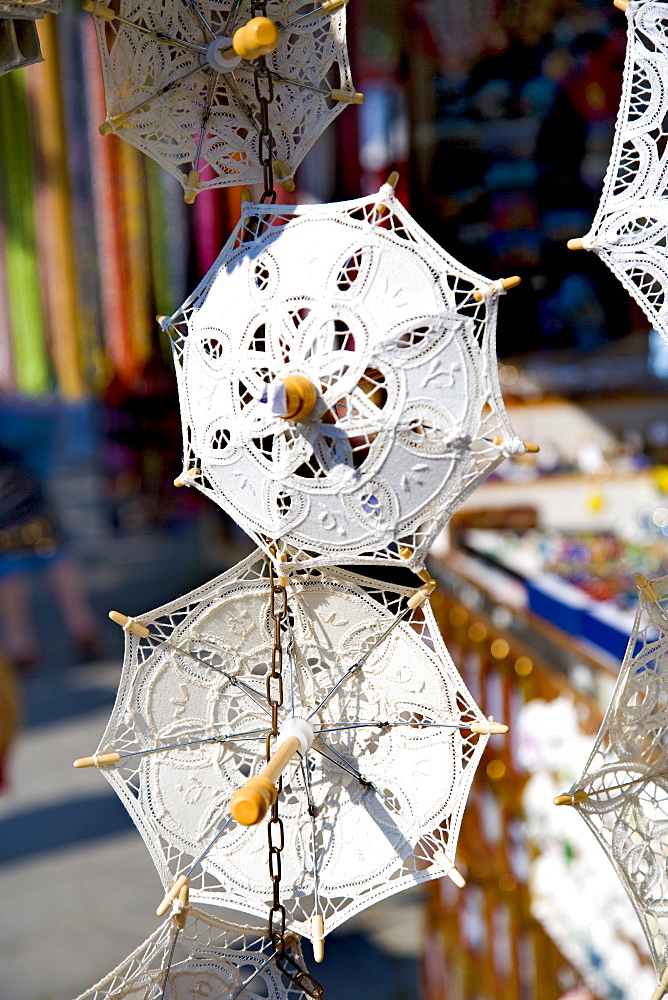 Umbrellas made of bobbin lace in a bobbin lace shop, Burano, Lagoon, Venice, Italy, Europe