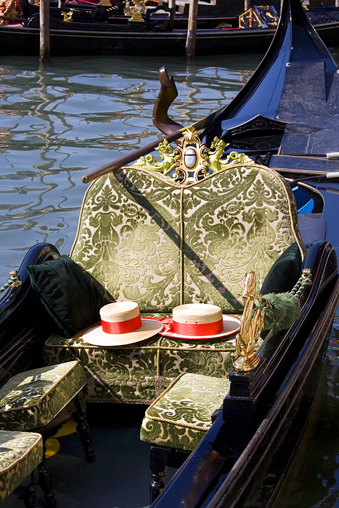 Gondolier's hats on a gondola, Venice, Veneto, Italy, Europe