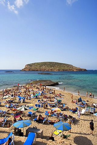 Tourists on the beach of Cala Comte, view of Conillera Island, Ibiza, Balearic Islands, Spain, Europe