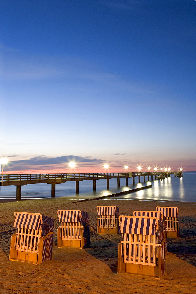 Beach chairs in evening light, pier, Kuehlungsborn, Baltic Sea, Mecklenburg-Western Pomerania, Germany, Europe