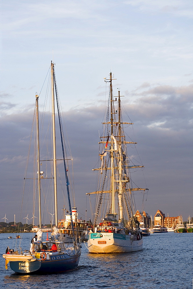 Sailing ships on the Warnow River at the Hanse Sail festival, city port, Rostock, Mecklenburg-Western Pomerania, Germany, Europe