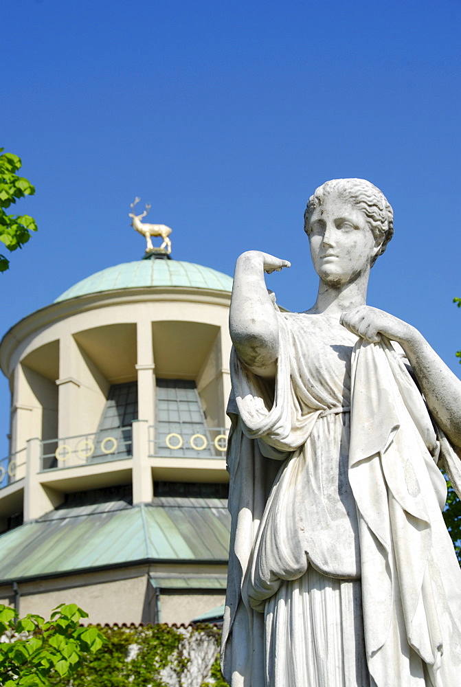 Art association building with statue in the palace gardens, Stuttgart, Baden-Wuerttemberg, Germany, Europe