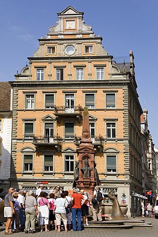 A guided city tour in the old town of Konstanz, Baden-Wuerttemberg, Germany