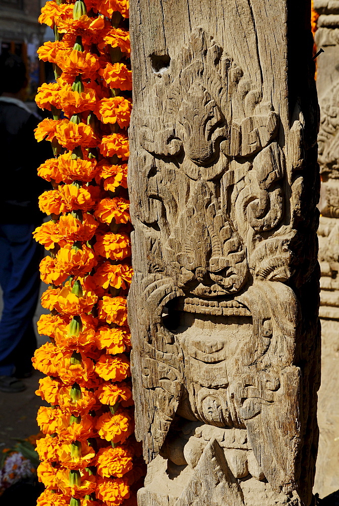 Carved wooden coloumn with flower decoration, Patan, Kathmandu, Nepal